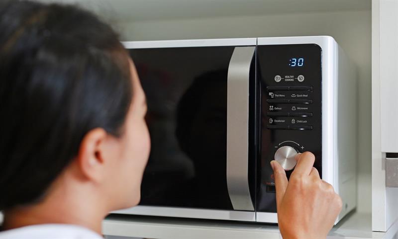 99% of energy consumed by a microwave accounts for standby mode and not heating.