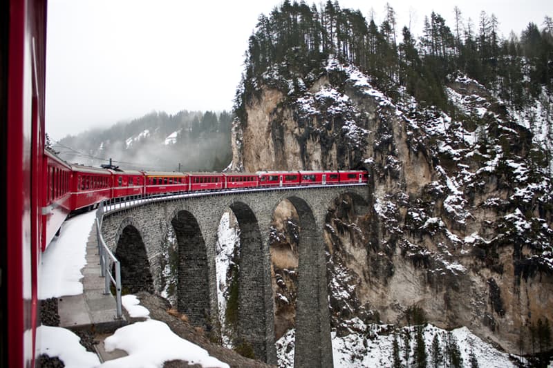 Geography Story: #8 The Landwasser Viaduct bridge around glacier mountains in Switzerland