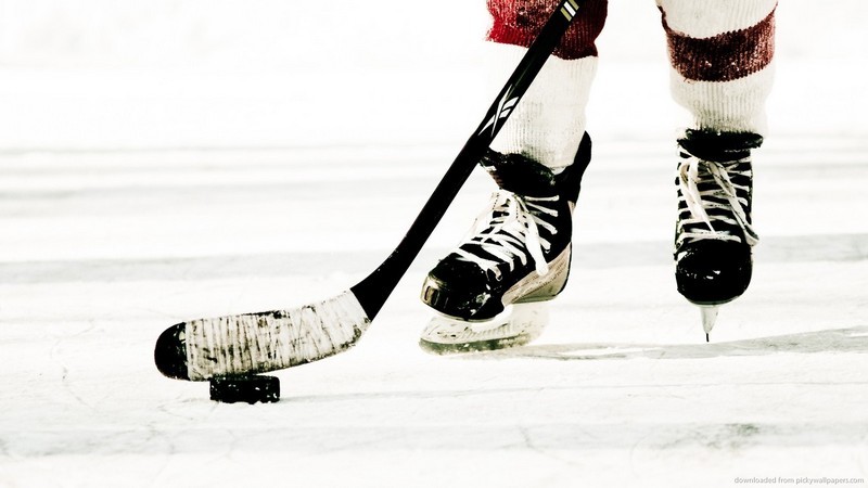 Sport Trivia Question: How many players are on an ice hockey team on the ice?
