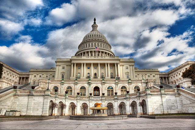 History Trivia Question: What figure crowns the dome of the US Capitol in Washington DC?