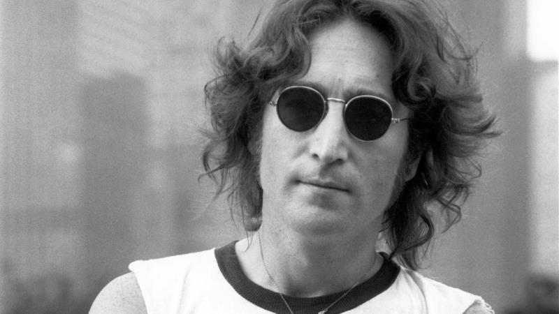 Society Trivia Question: Why did John Lennon's first wife file a divorce against him?