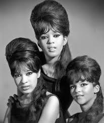 Society Trivia Question: What is the name of the popular 1960s hairdo formed into a towering mesh of hair by ratting large strands on the top of the head, then smoothing them over for a tall, full effect?