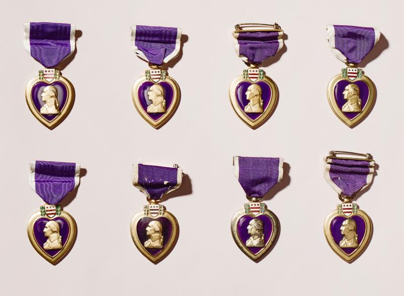 History Trivia Question: Who received the most Purple Heart Medals (9) during his military service?