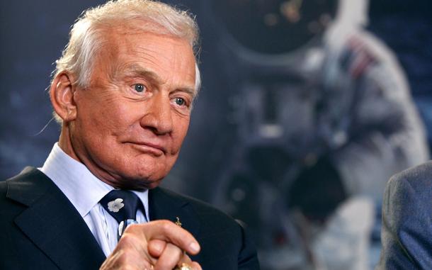 History Trivia Question: What investigative reporter was punched by astronaut Edwin (Buzz) Aldrin, on September 9, 2002, for having challenged him that NASA's moon missions were all faked?"