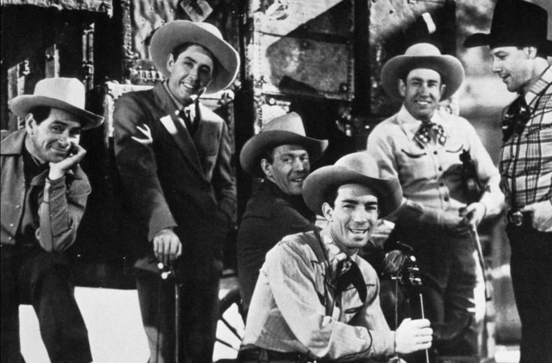 Movies & TV Trivia Question: Who was the first "singing cowboy" of the movies?