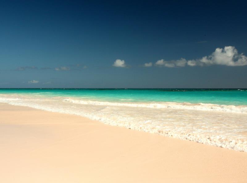 Geography Trivia Question: Named for the famous 3 mile pink sand beach, where is Pink Sands Resort located?