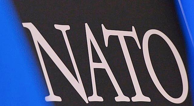 Society Trivia Question: What symbolic emblem is found on NATO's flag?
