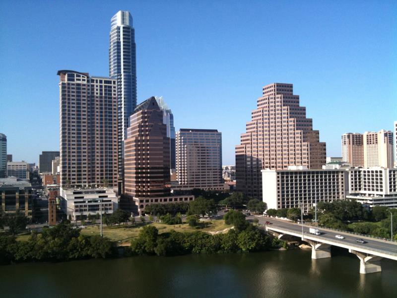 Geography Trivia Question: If you travel SSW from the Texas state capital, what is the first major city you will arrive?