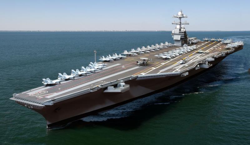 History Trivia Question: What was the name of the first aircraft carrier to be constructed with an angled flight deck and steam catapults?