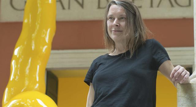 Culture Trivia Question: A famous work by the British artist Sarah Lucas is entitled 'Self Portrait with...'?