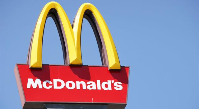 History Trivia Question: In what city was the first McDonald's franchise using the arches logo opened?
