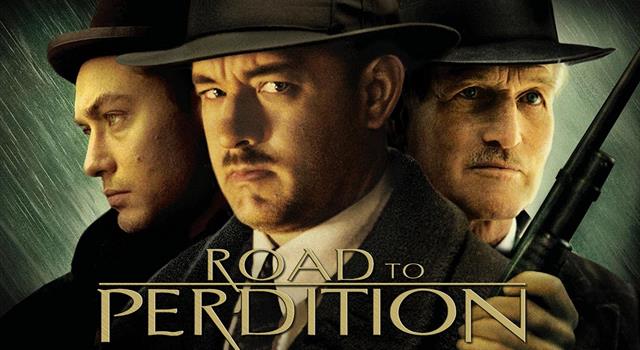 Movies & TV Trivia Question: In the movie, "Road to Perdition", Jude Law plays hitman, Harlen Maguire. What is his everyday job?