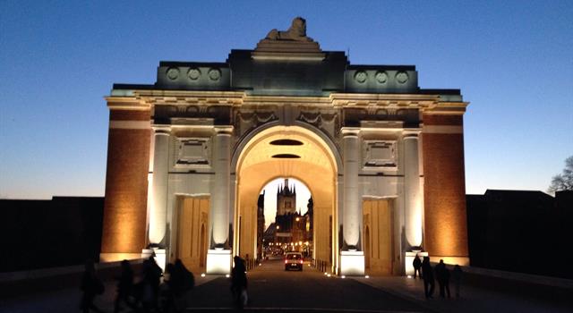 History Trivia Question: The Menin Gate memorial stands near what town, the scene of several battles in the First World War?