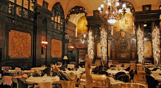Movies & TV Trivia Question: In "Scent of a Woman," Colonel Frank Slade takes Charlie to a fancy restaurant called The Oak Room. How much do hamburgers cost at this restaurant?