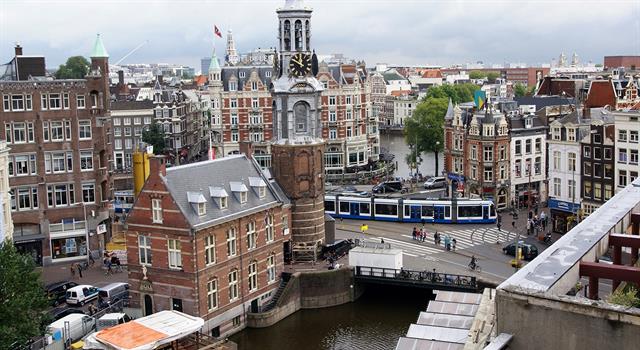 Geography Trivia Question: What major river runs through Amsterdam?