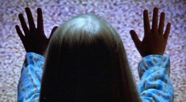 Movies & TV Trivia Question: What kind of a doll grabs Robbie and drags him under his bed in the 1982 film  "Poltergeist"?