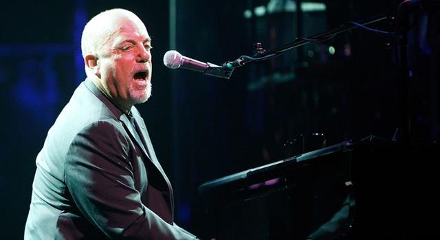 Culture Trivia Question: At what time and day is Billy Joel singing "Piano Man"?