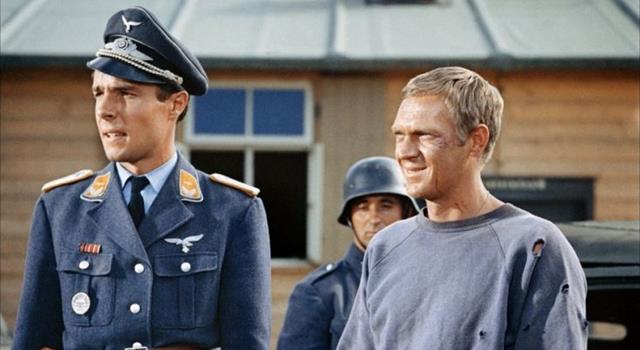 Movies & TV Trivia Question: In the film 'The Great Escape', the Cooler King passes time in solitary confinement with the help of what ball?