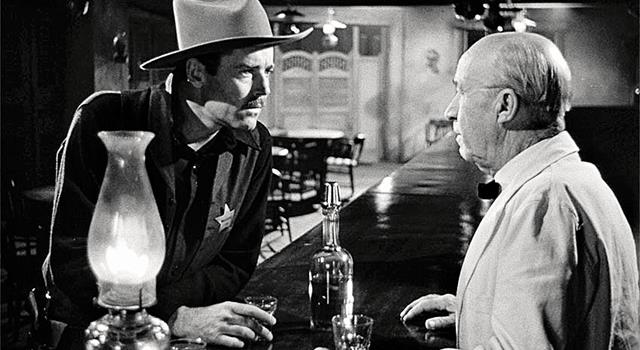 Movies & TV Trivia Question: Which character in the film, "My Darling Clementine" says, "I ain't committin' suicide on myself."?