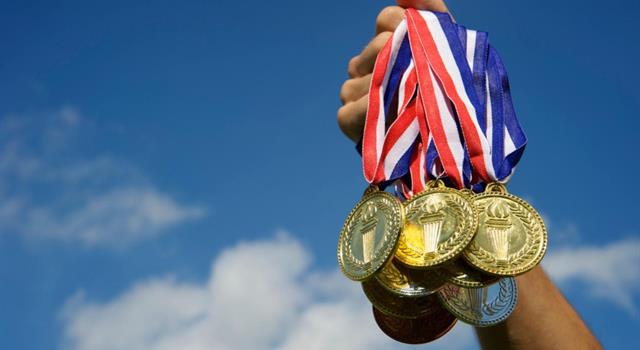Sport Trivia Question: Modern Olympic Gold medals are 92.5% silver and plated with only 6 grams of gold.  When was the last "solid gold" medal awarded?
