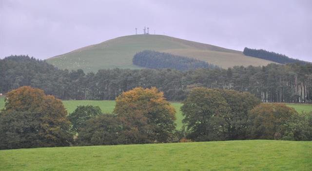 Geography Trivia Question: What name has been coined for a hill in the UK that has a drop of at least 150m on all sides?
