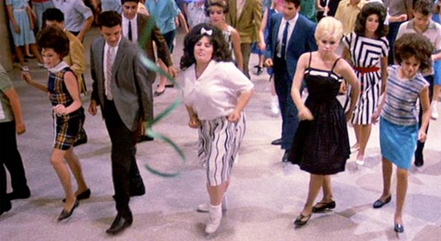 Movies & TV Trivia Question: Who directed the 1988 film 'Hairspray'?