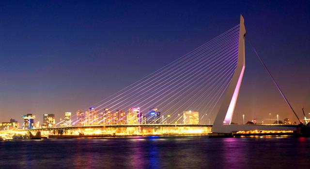 Geography Trivia Question: The Erasmus Bridge links the northern and southern parts of which city?