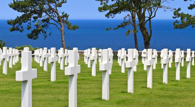 Society Trivia Question: How many US military dead are buried at the Normandy American Cemetery and Memorial?