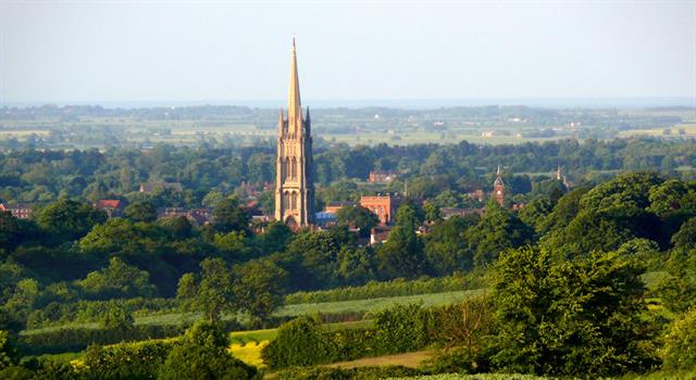History Trivia Question: In which Lincolnshire town is England's highest Anglican church spire?