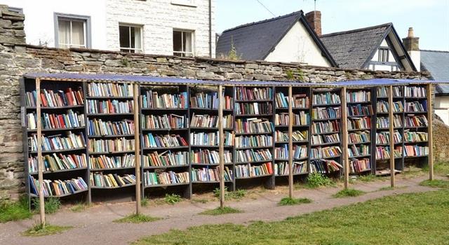 Geography Trivia Question: Which town in Powys, Wales is known as the 'town of books'?