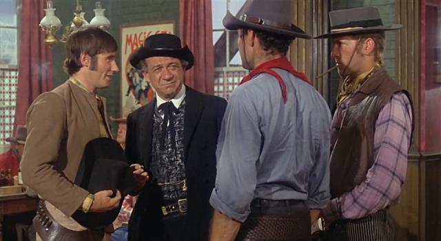 Movies & TV Trivia Question: What was the name of the western town in the film 'Carry On Cowboy'?