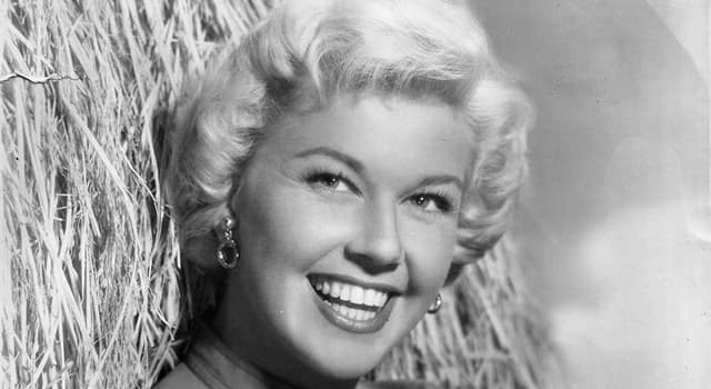 Movies & TV Trivia Question: In which film does Doris Day not sing any part of the song "Que Sera Sera"?