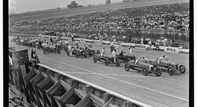 Sport Trivia Question: In which year did the winning race car first exceed 100 mph in the Indianapolis 500 automobile race?