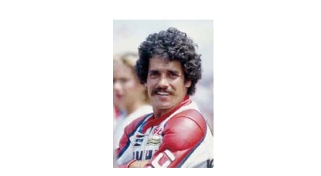 Sport Trivia Question: On what make of motorcycle did Carlos Lavado win the 250 cc Motorcycling World Title in 1983 and 1986?