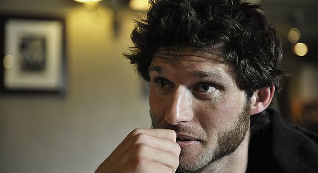 Sport Trivia Question: TV presenter Guy Martin made his name participating in which sport?