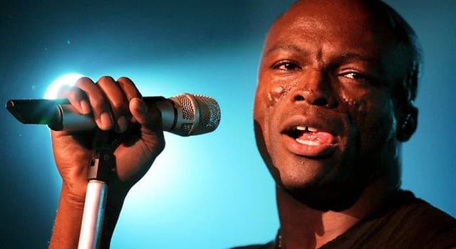 Maatschappij Trivia Vraag: Wat is de oorzaak van de littekens op de huid van singer-songwriter Seal?