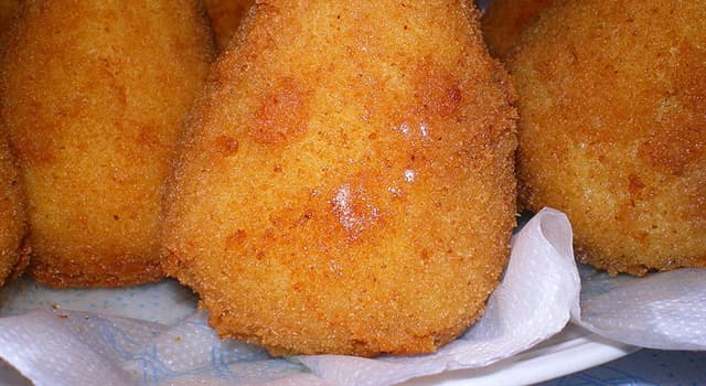 Culture Trivia Question: What volcano in eastern Sicily inspired the shape of the rice balls in the dish 'Arancini'?