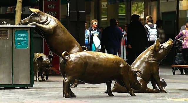 Society Trivia Question: In which location will you find a bronze sculpture of a group of 4 life-sized pigs called "A Day Out"?