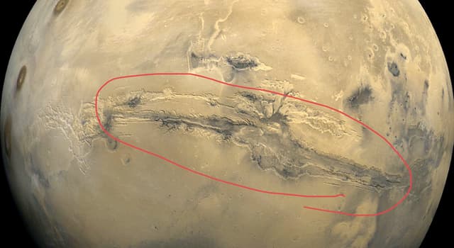 Wetenschap Trivia Vraag: Wat is de naam van dit gebied op de planeet Mars, rood omcirkeld op de foto?