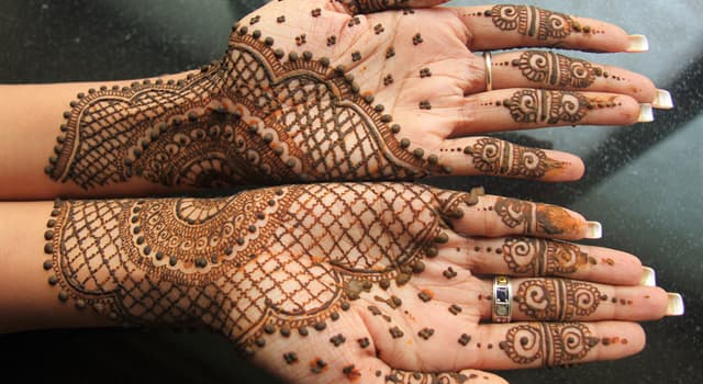 Culture Trivia Question: What is the pictured body art originating in ancient India called?