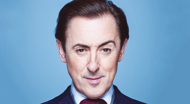 Movies & TV Trivia Question: What was Alan Cumming's minor role in the film "Eyes Wide Shut"?