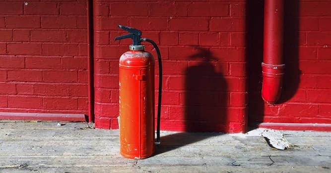 Culture Trivia Question: According to UK colour codes, a fire extinguisher that displays a black label contains which medium?
