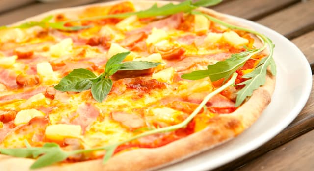 Cultuur Trivia Vraag: Welk fruit zit er op de pizza Hawaï?