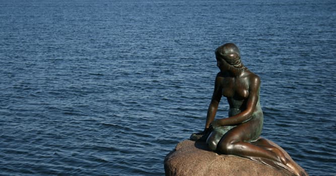 Geography Trivia Question: The statue of 'The Little Mermaid' sits on a rock in the harbour of which European capital city?