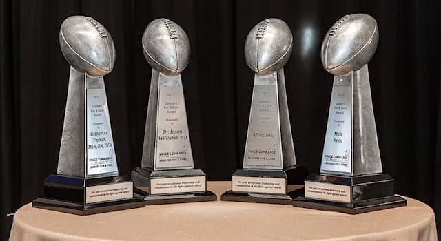 Sport Trivia Question: What company makes the USA National Football League's Vince Lombardi Trophy?