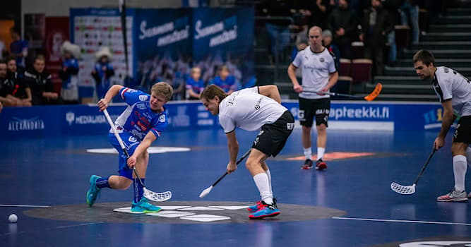 Sport Trivia Question: How many players can each team field at a time on the court in floorball?