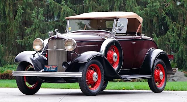 Culture Trivia Question: Which motorcar company manufactured this 1932 Model 18 Roadster?