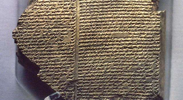 History Trivia Question: Which writing system is the text in The Gilgamesh Tablet?