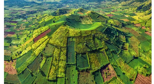 Geography Trivia Question: In which country can this dormant volcano, covered in a patchwork of crops, be found?