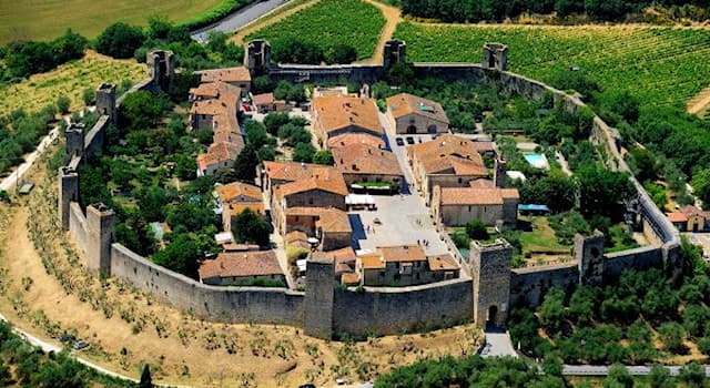 Geography Trivia Question: In which country is this medieval walled town built by the Sienese in 1214–19?